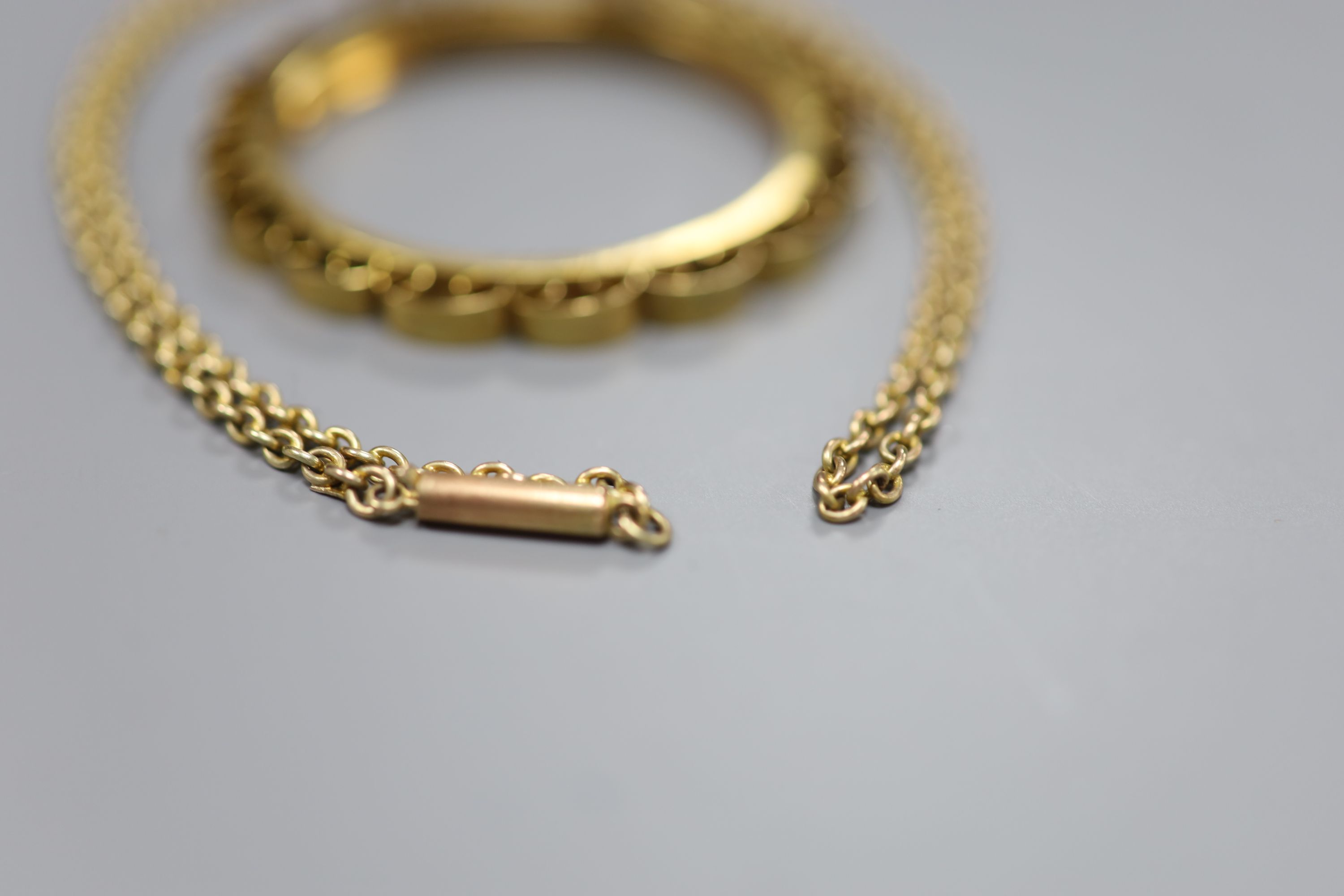 A 9ct chain, 41cm and a 9ct gold pendant mount, gross 11.8 grams.